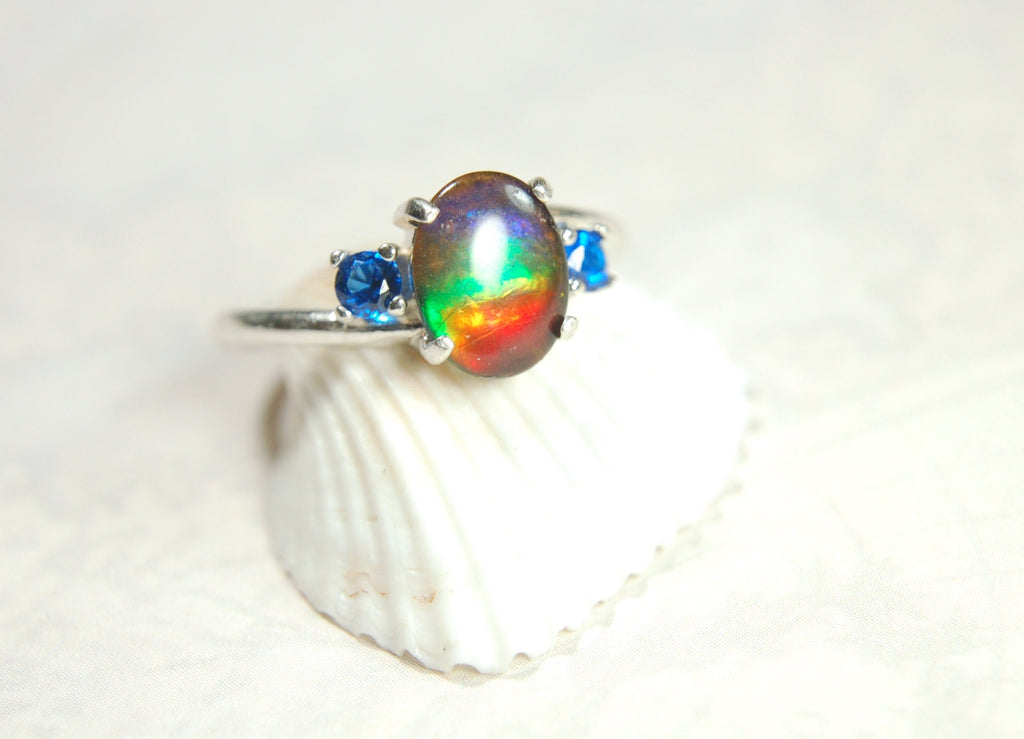 Ammolite Ring with brilliant Spinel side stones.Size 7.