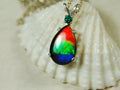 Ammolite Jewelry Pendant.bright Rainbow Colors. Ammolite with Emerald.Canadian gemstones.The perfect RARE gift for her.#012410