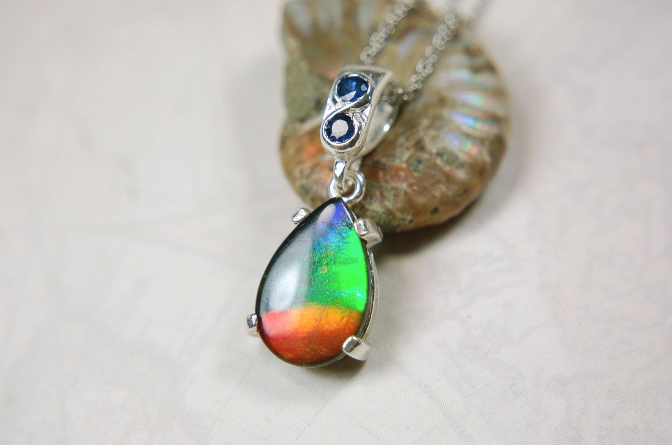 Ammolite Pendant Necklace.Sapphire studded bail.Brilliant rainbow colors.Sterling silver set.RARE gift for her.071115