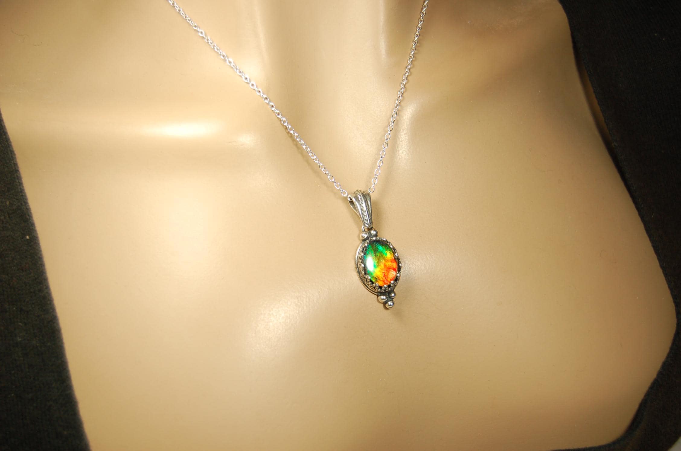Ammolite pendant gift idea for wife..has four bright colors.041716