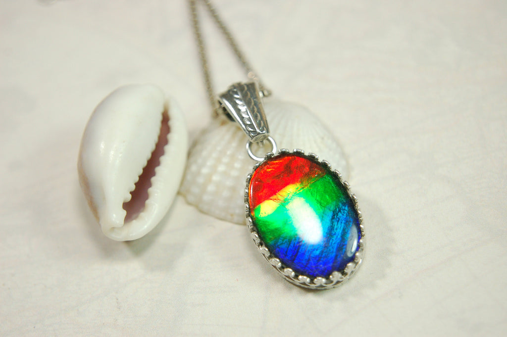 Colorful ammolite pendant - a one-of-a-kind addition to your collection or a perfect gift for someone special"021224