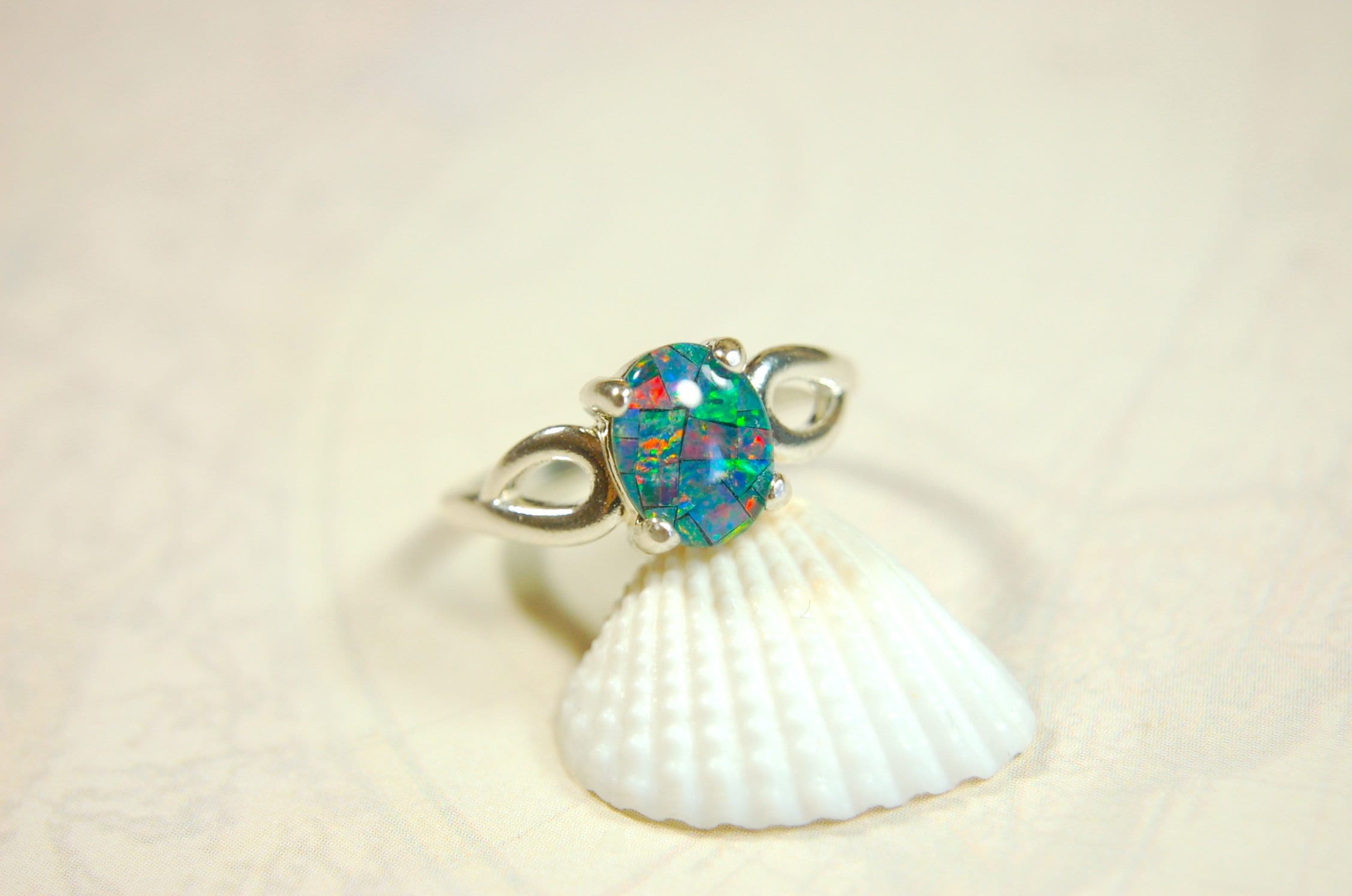 Australian Opal Ring.Gorgeous colors. Set in Sterling Silver.The perfect gift.Size 7 Boho style.