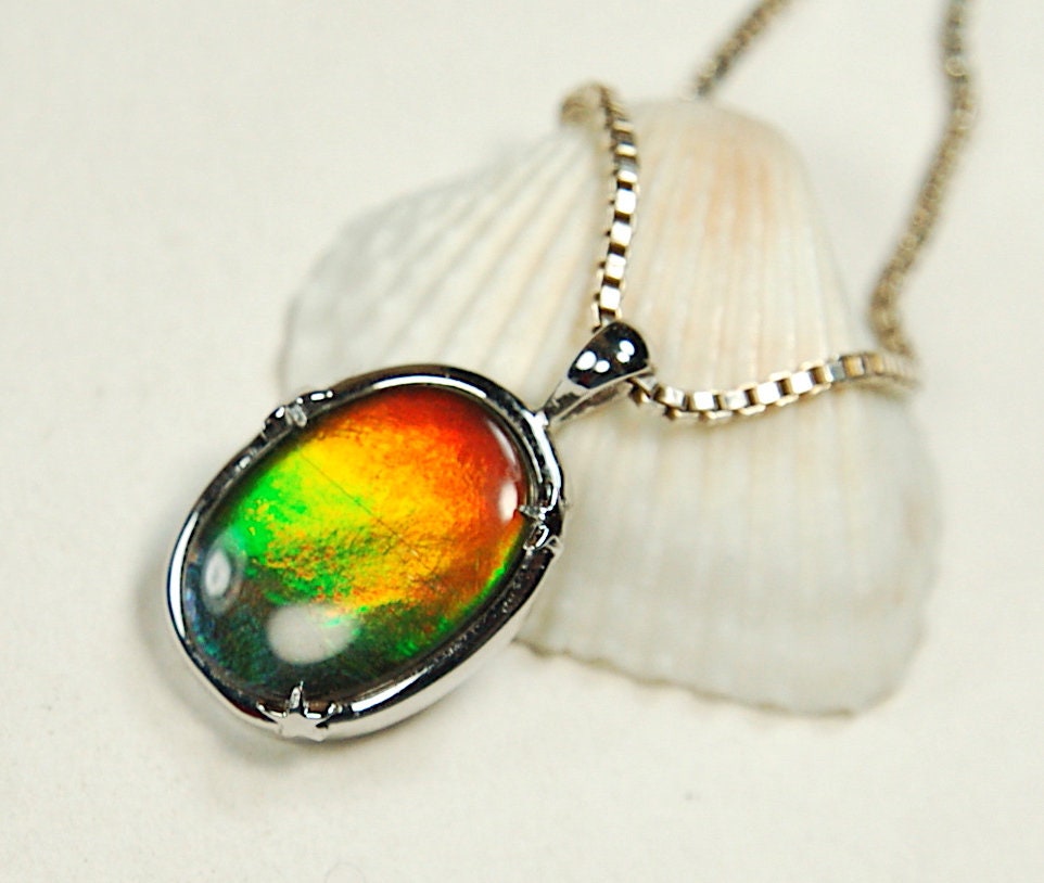 Ammolite Jewelry pendant with lovely rich colors that amaze.Canadian ammolite.Ammolite jewelry at its best.Ammolite from Canada.#051012