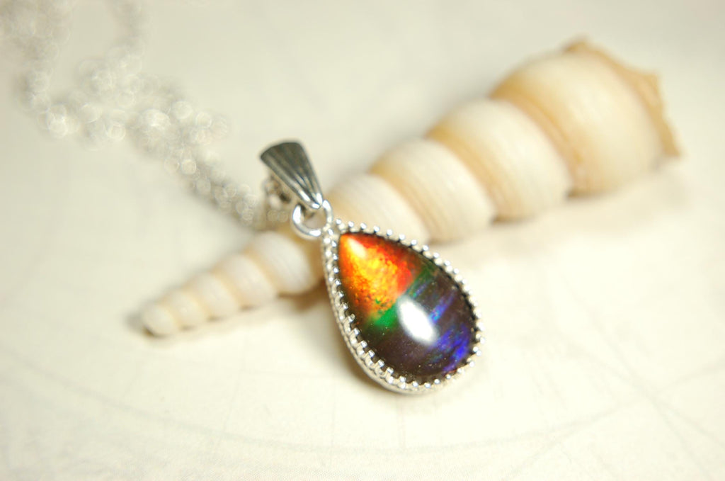 Dainty ammolite pendant.Brilliant color gem.Feminine jewelry.UniqueGift for her.Canadian gemstone.Sterling Silver setting.021126