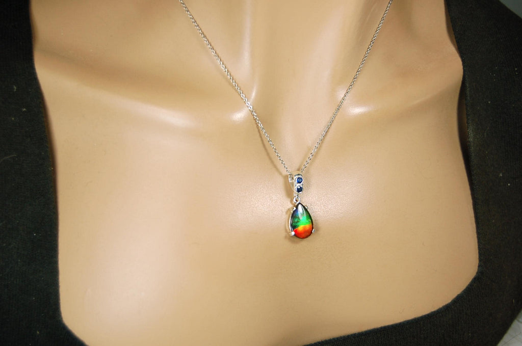 Ammolite Pendant Necklace.Sapphire studded bail.Brilliant rainbow colors.Sterling silver set.RARE gift for her.071115