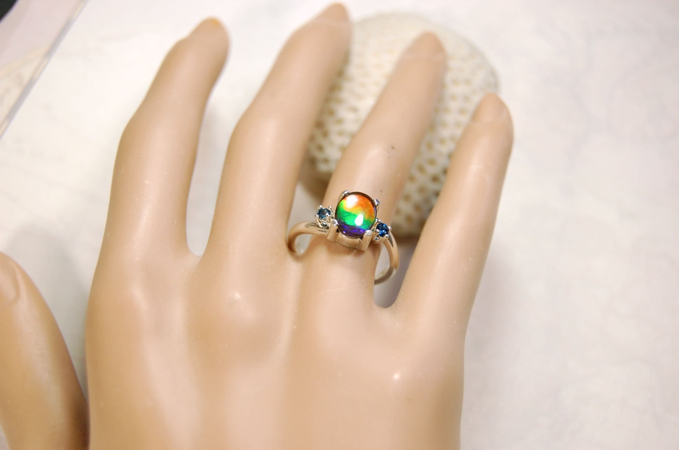 Ammolite Ring with Sapphire side stones.Lovely four color gem.Size 7.-#040314