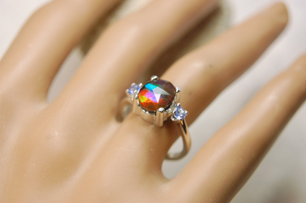 Ammolite Jewelry Ring with Tanzanites.No import taxes under CUSMA rules.022414