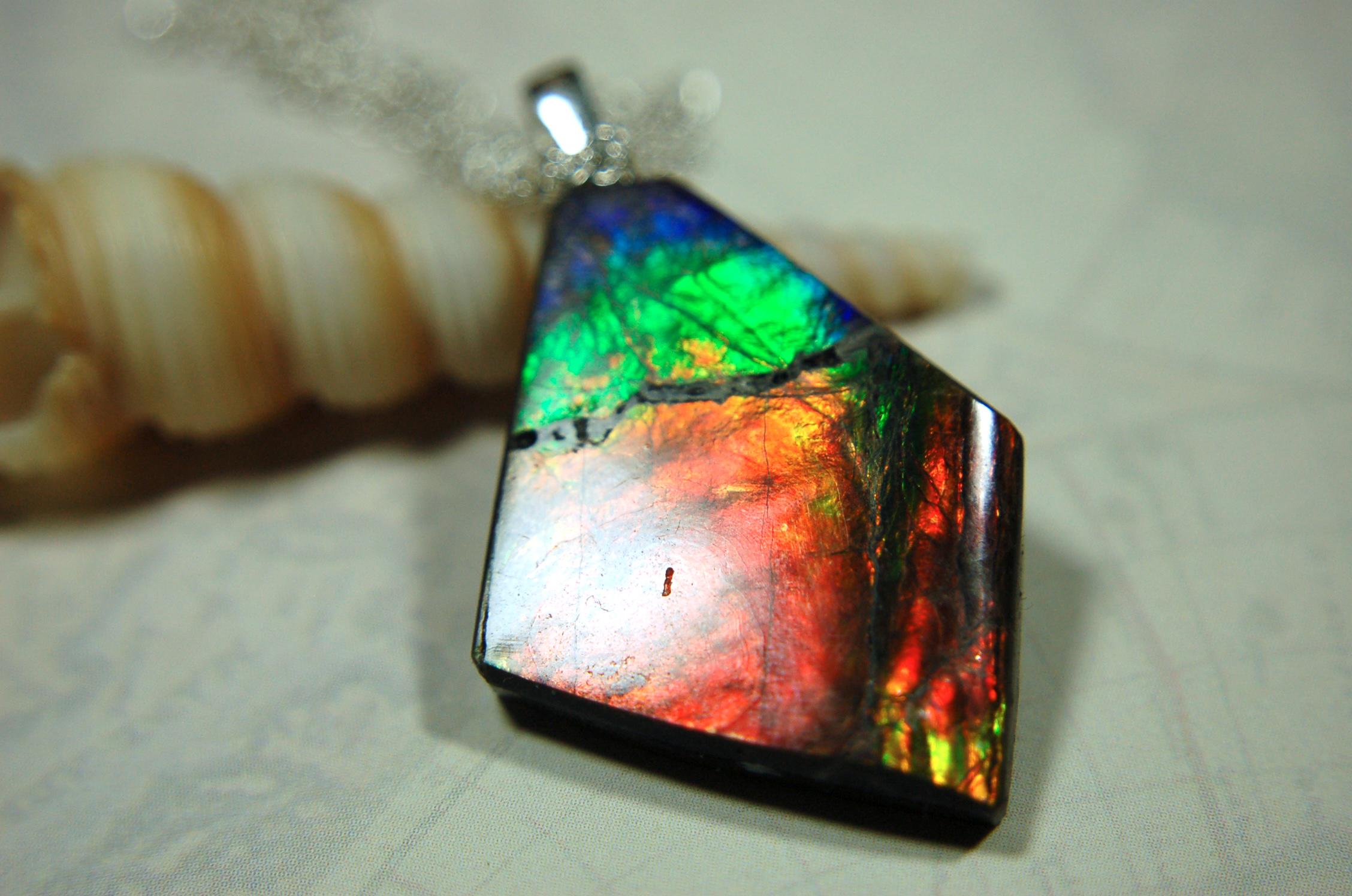 Ammolite pendant necklace.Unique raw natural cabochon with brilliant varied colors.Unisex design.Boho jewelry.031716