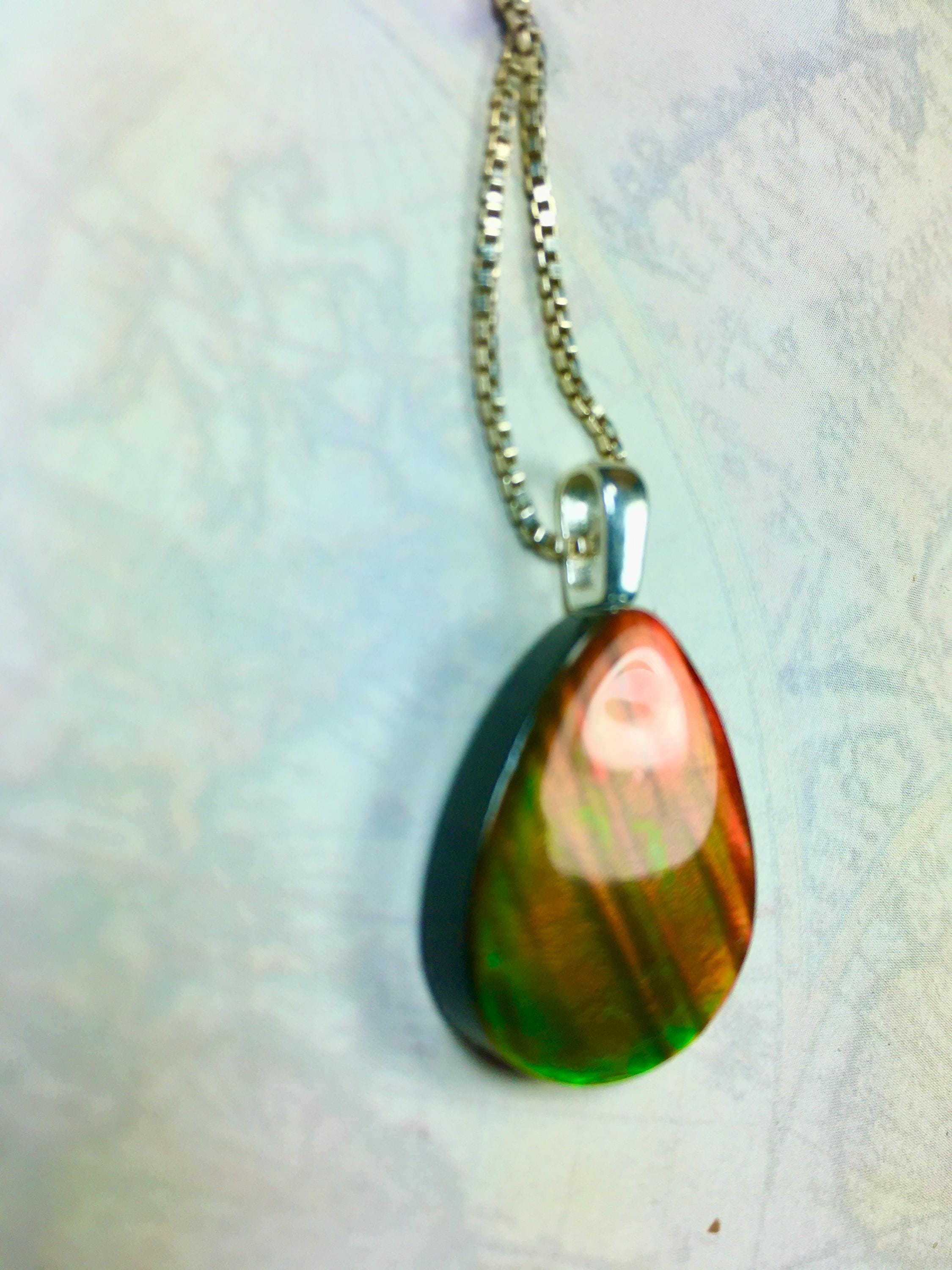 Red Ammolite Pendant with Tiger Stripes.Gift for wife.Brilliant color changing gem.All Natural Cabochon gem.062325