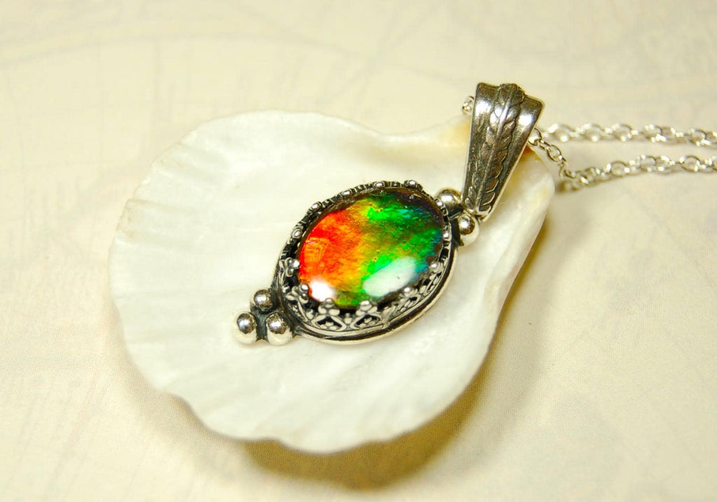 Ammolite pendant gift idea for wife..has four bright colors.041716