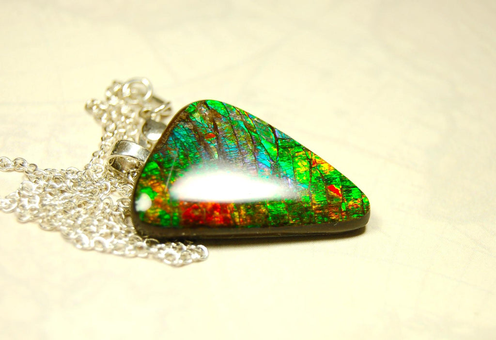 Natural Ammolite Gemstone Pendant from Alberta Canada with bright rich varied colors. A perfect Unisex  birthday gift. 032416