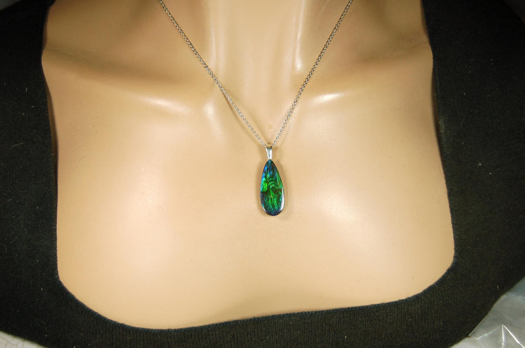 Ammolite Jewelry Pendant.All natural high quality cabochon from Alberta Canada.070715