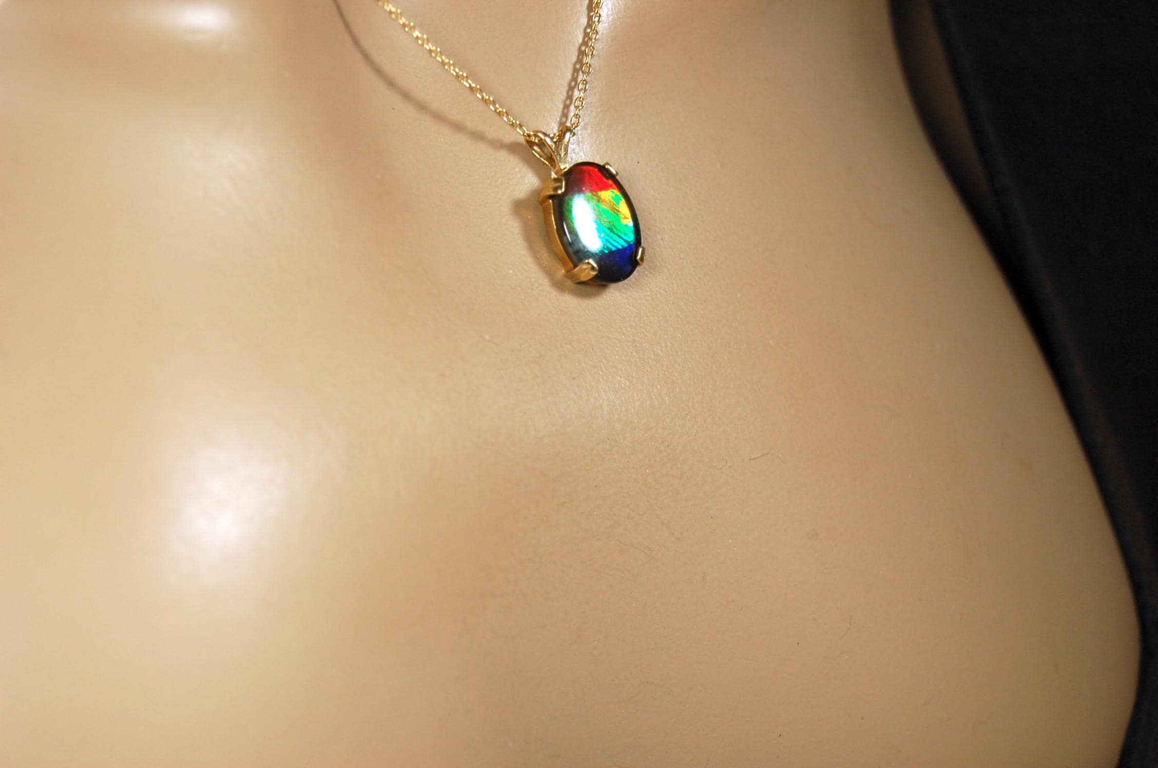 Ammolite necklace pendant in solid 10k yellow gold.A gift your wife will treasure.Brilliant color changer. 071601
