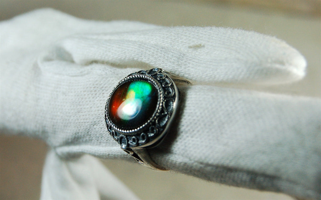 Ammolite Ring.Adjustable fit.Brilliant flashing colors.022219.