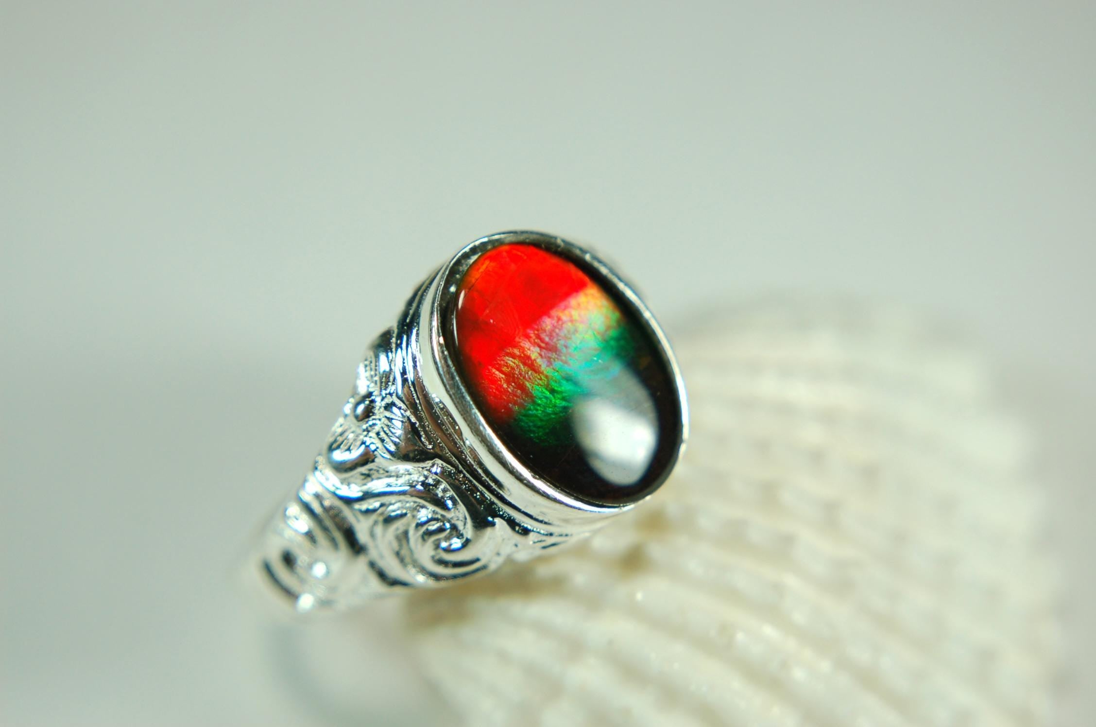 Ammolite Mens Ring.Size 12.Brilliant tricolor gem with rich deep changing colors.Solid sterling setting.011115
