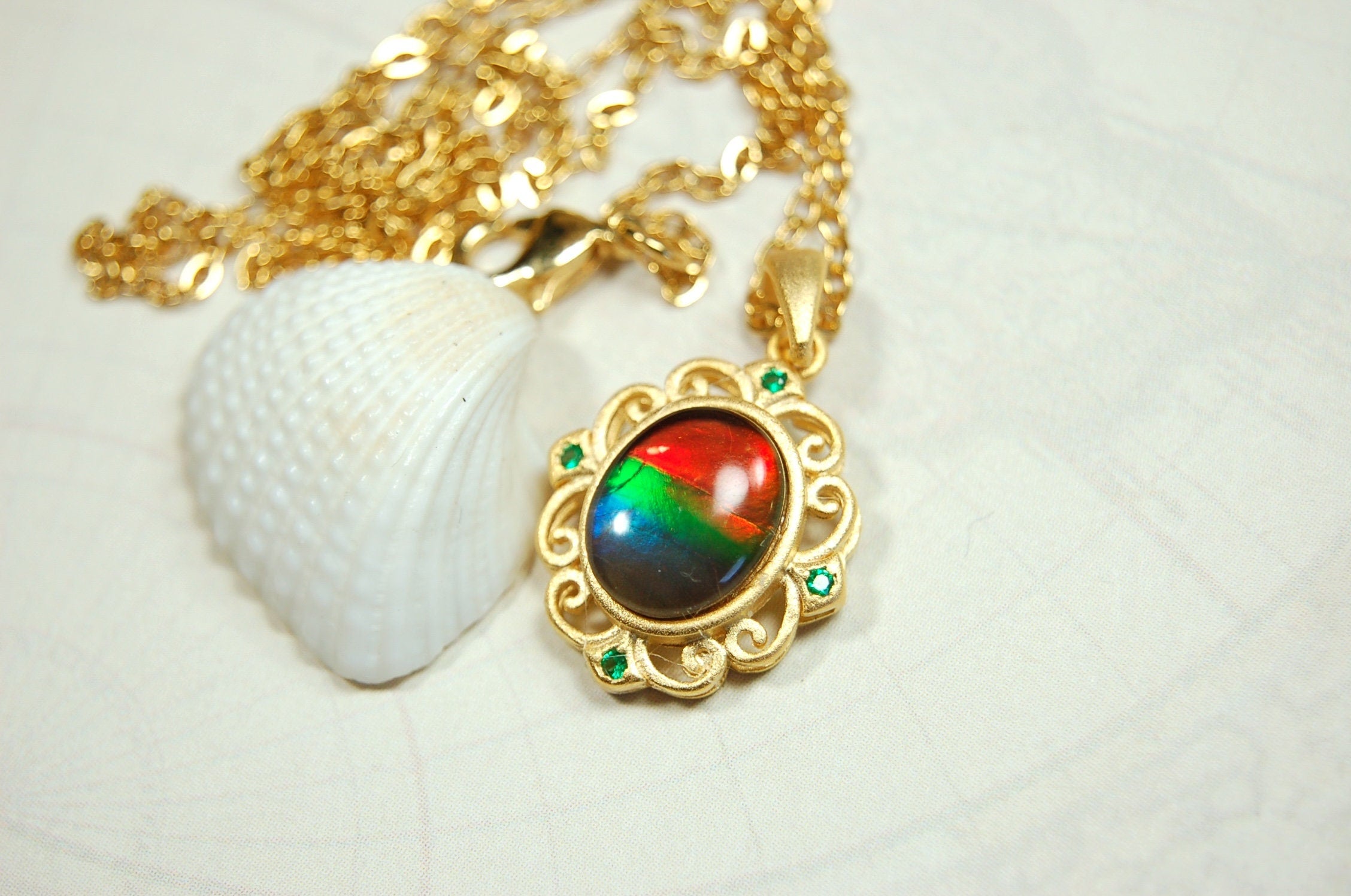 Eye-Catching Ammolite Pendant - Elevate your Look with this Stunning Ammolite Jewelry!Thoughtful gift?.052714