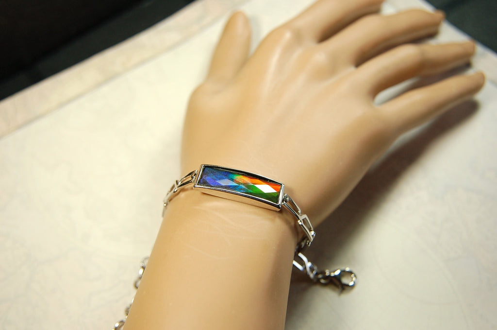 Ammolite Jewelry bracelet.Bright faceted gem shipped free.No import tax to US under CUSMA exemption #070614