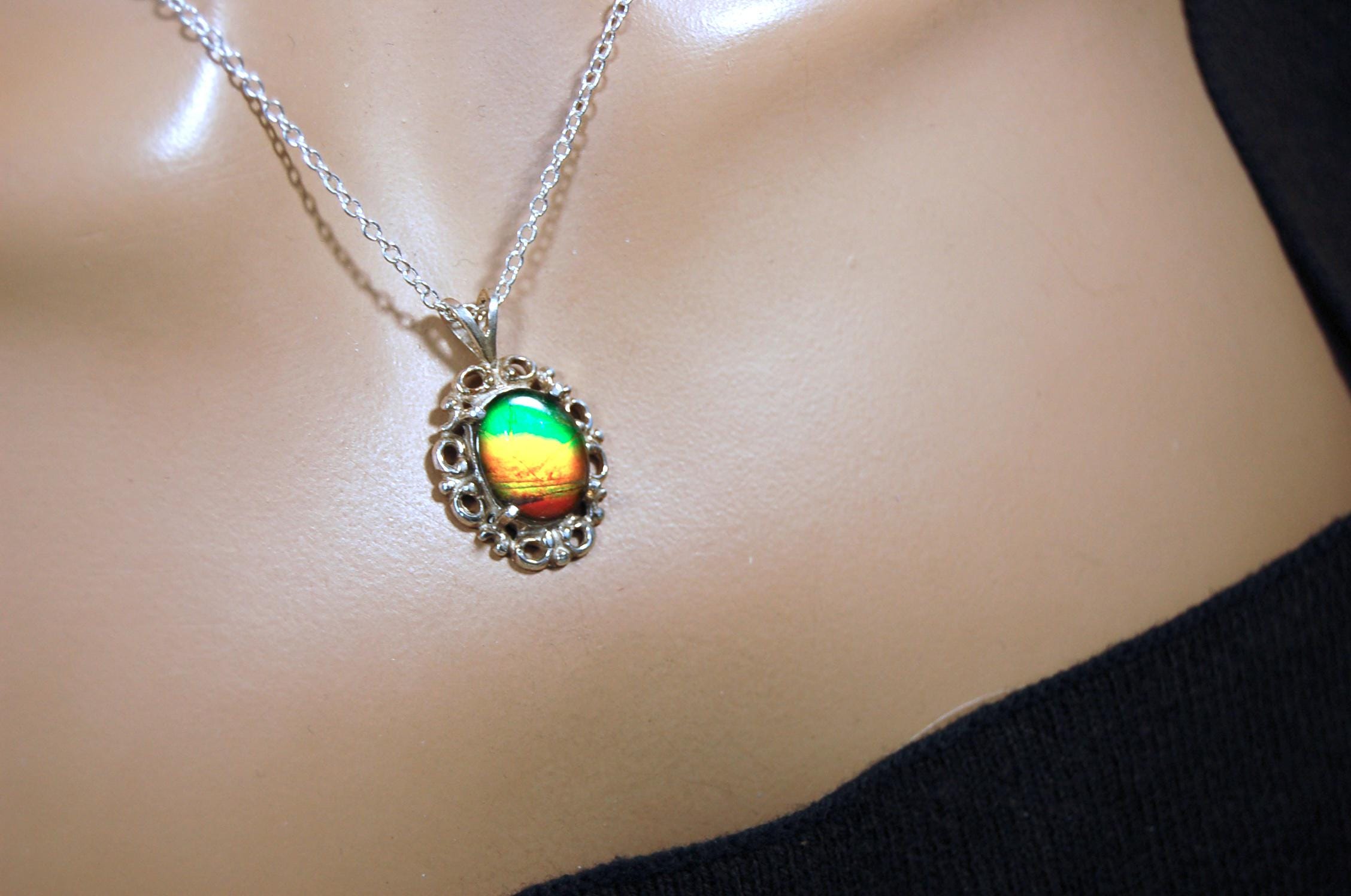 Ammolite pendant petite but powerful impact.Rich Sunset colors.Memorable gift.Fashion accessory.Rare jewelry.022216