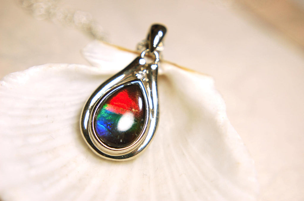 Ammolite pendant.Petite,feminine but very powerful.Rainbow color gem with sapphire.Birthday or Anniversary Gift for wife? 030416