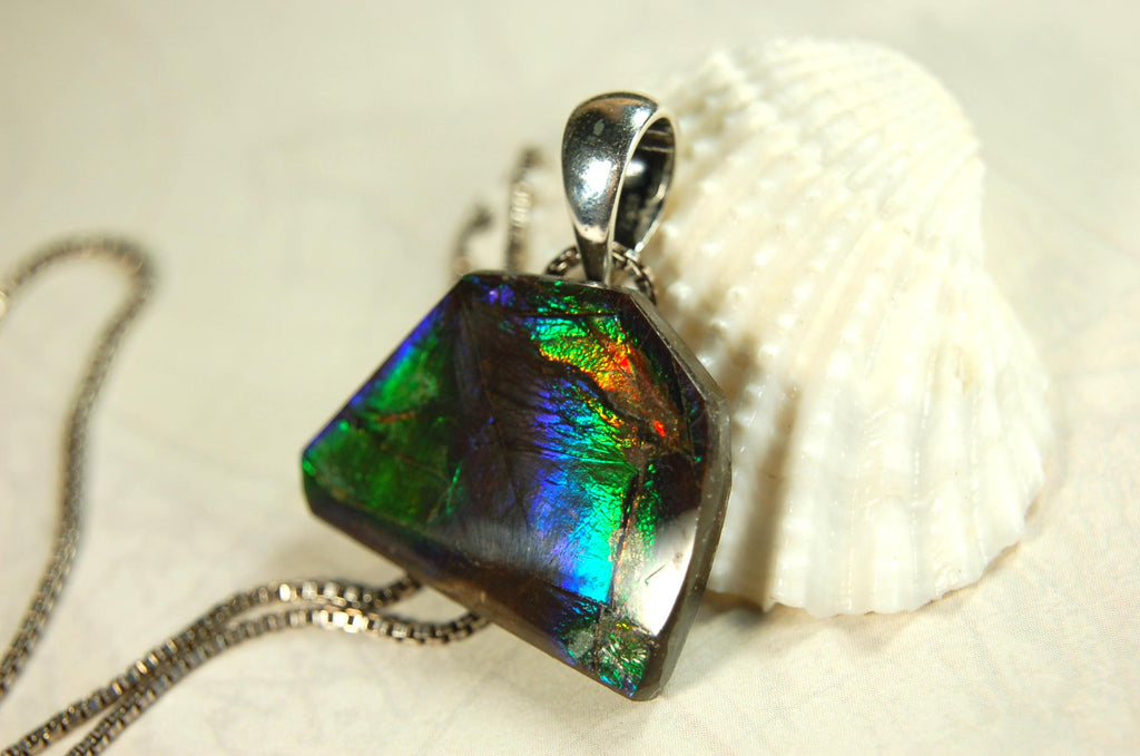 Ammolite Jewelry Pendant Certified Canadian Gem.Ammolite Freeform Gem.Unisex and minimalist Style Jewelry.Gift idea?Must see video. 081714