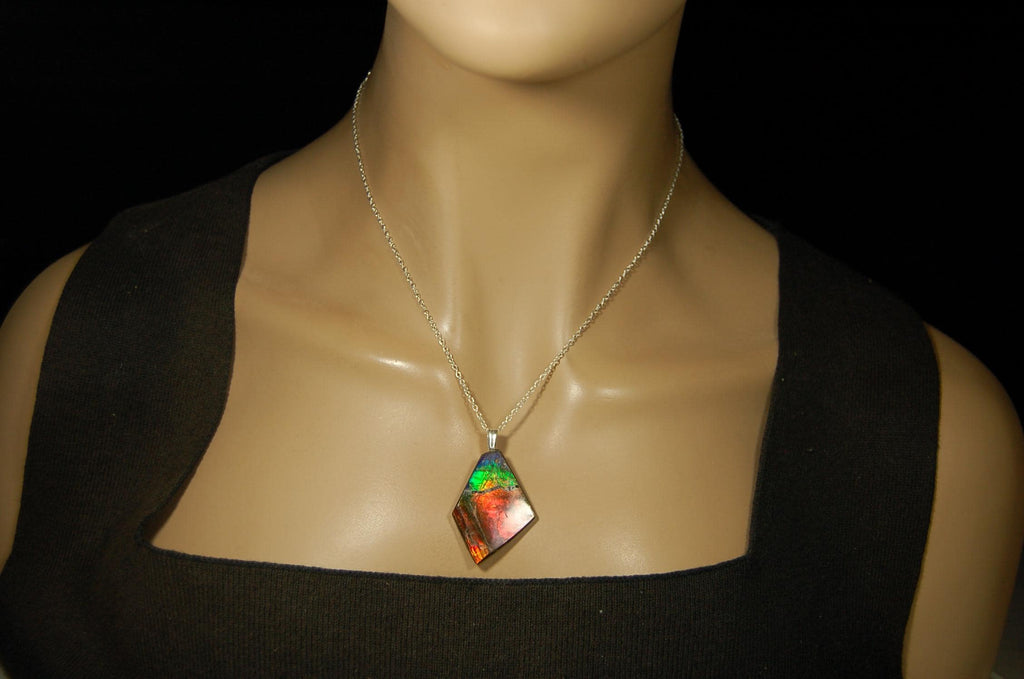 Ammolite pendant necklace.Unique raw natural cabochon with brilliant varied colors.Unisex design.Boho jewelry.031716