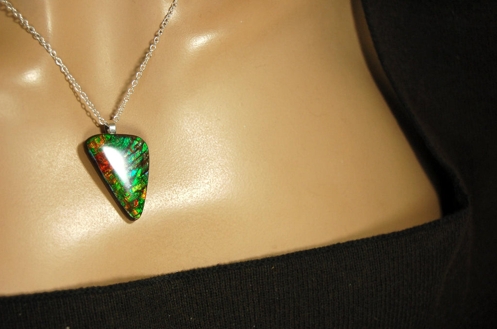 Natural Ammolite Gemstone Pendant from Alberta Canada with bright rich varied colors. A perfect Unisex  birthday gift. 032416