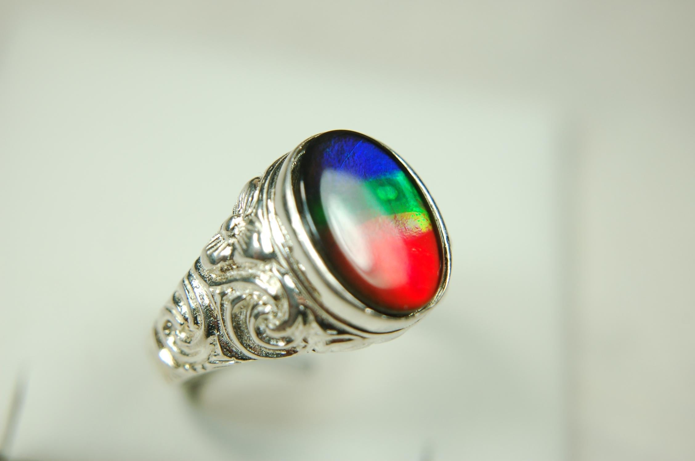Ammolite Mens Ring set in sculptured sterling silver.Powerful bright tricolor gemstone in size 10.#70615