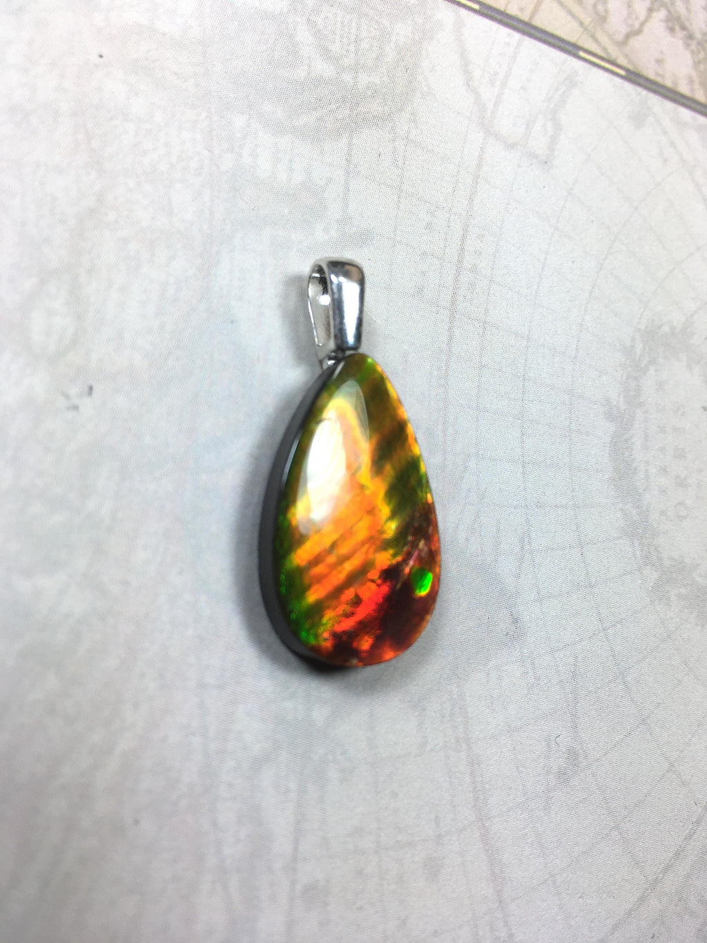 Anniversary gift idea.Unisex Jewelry.Ammolite Pendant Necklace, Sterling Silver Feather Bail. Color changing natural freeform cabochon.