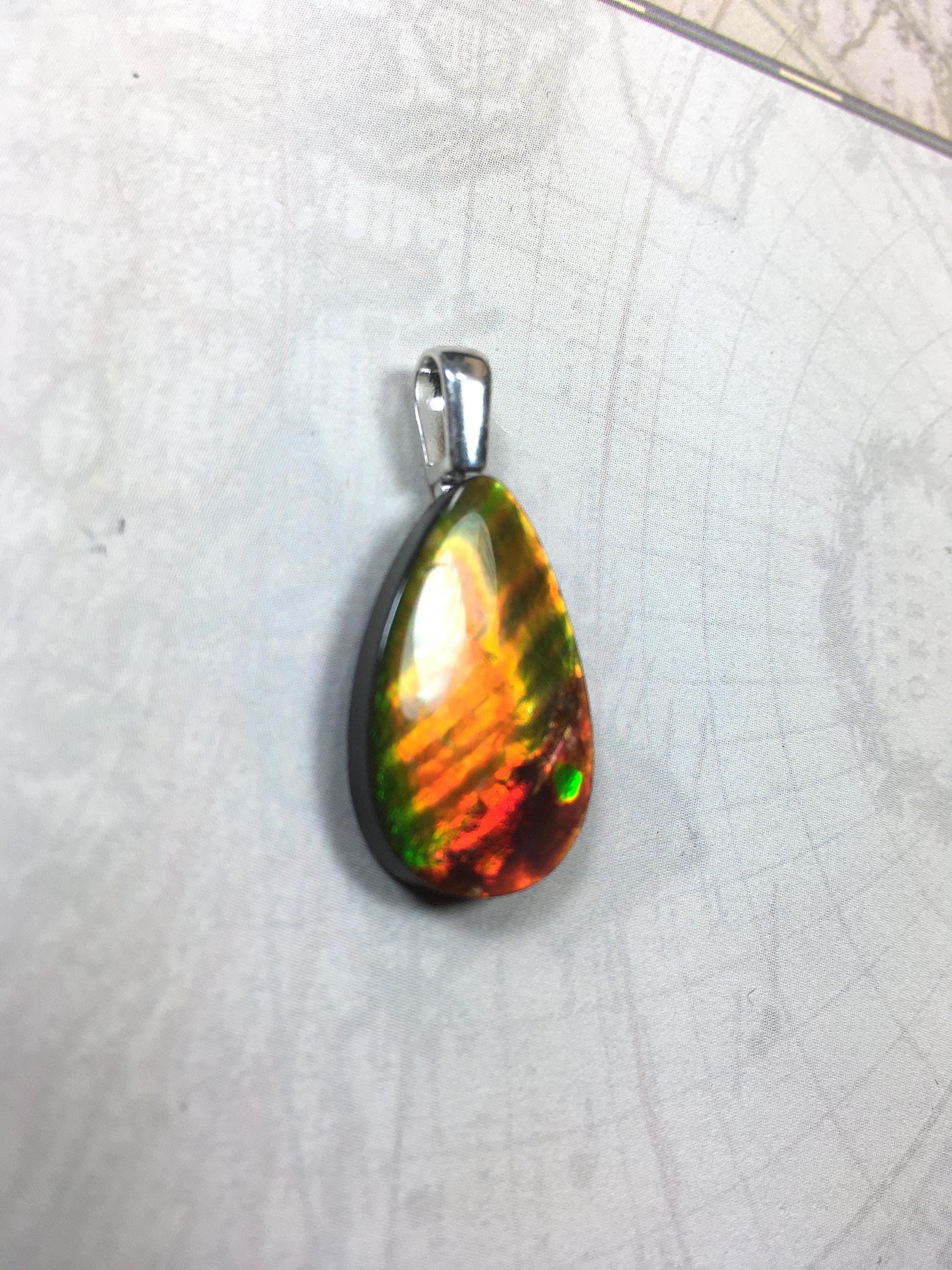 Anniversary gift idea.Unisex Jewelry.Ammolite Pendant Necklace, Sterling Silver Feather Bail. Color changing natural freeform cabochon.