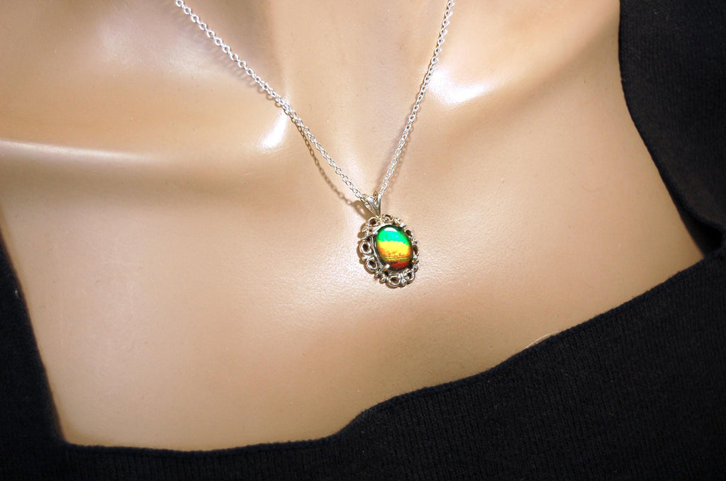 Ammolite pendant petite but powerful impact.Rich Sunset colors.Memorable gift.Fashion accessory.Rare jewelry.022216
