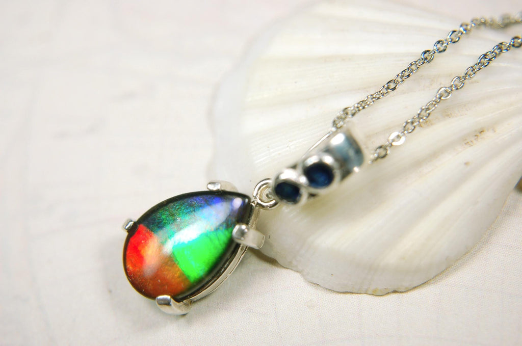 Ammolite Pendant Necklace.Sapphire studded bail.Brilliant rainbow colors.Sterling silver set.RARE gift for her.071115