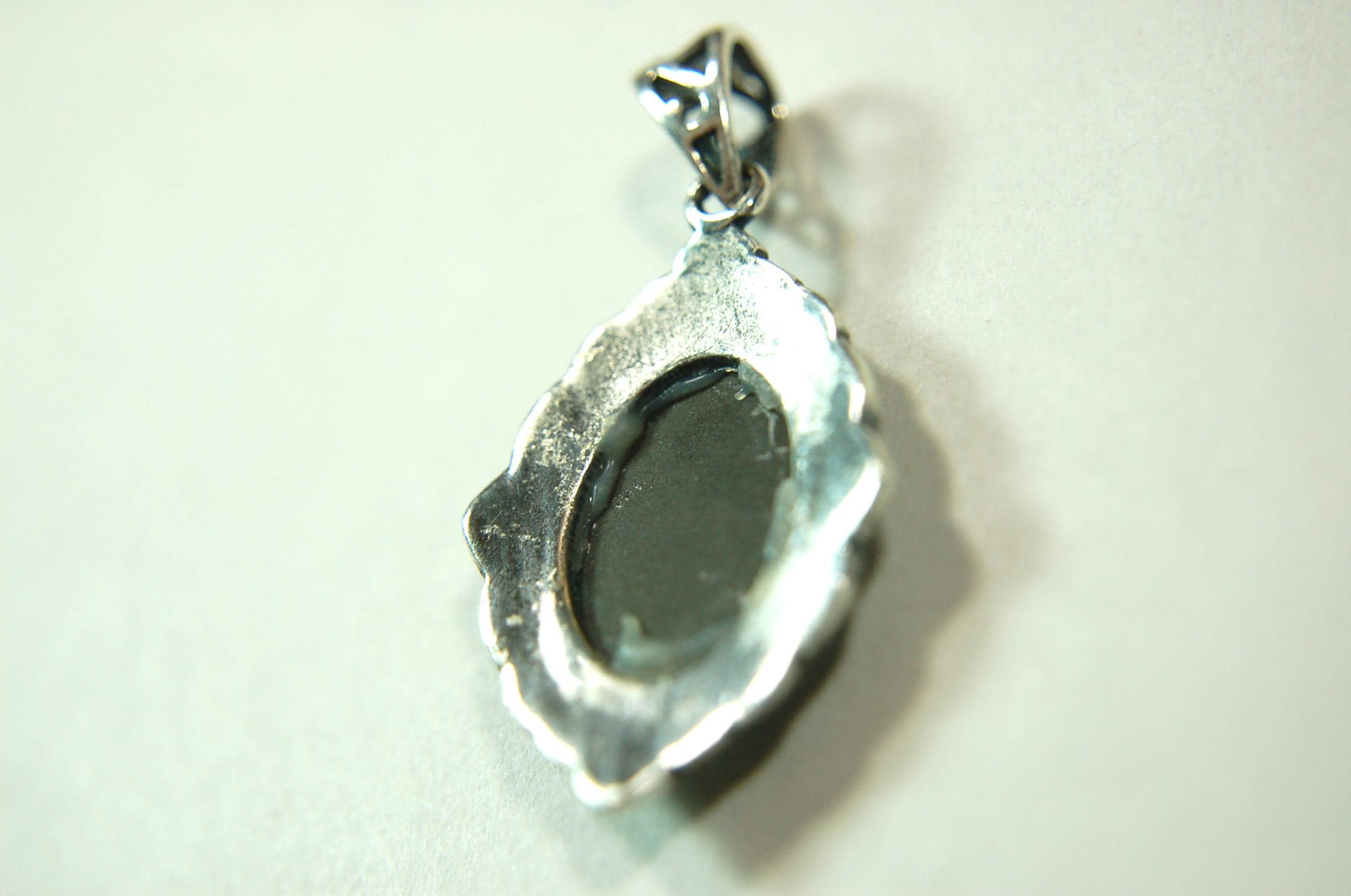 Ammolite jewelry pendant-a wifes birthgay gift Idea she will treasure.Genuine high quality ammolite mined and shipped from Canada.013115