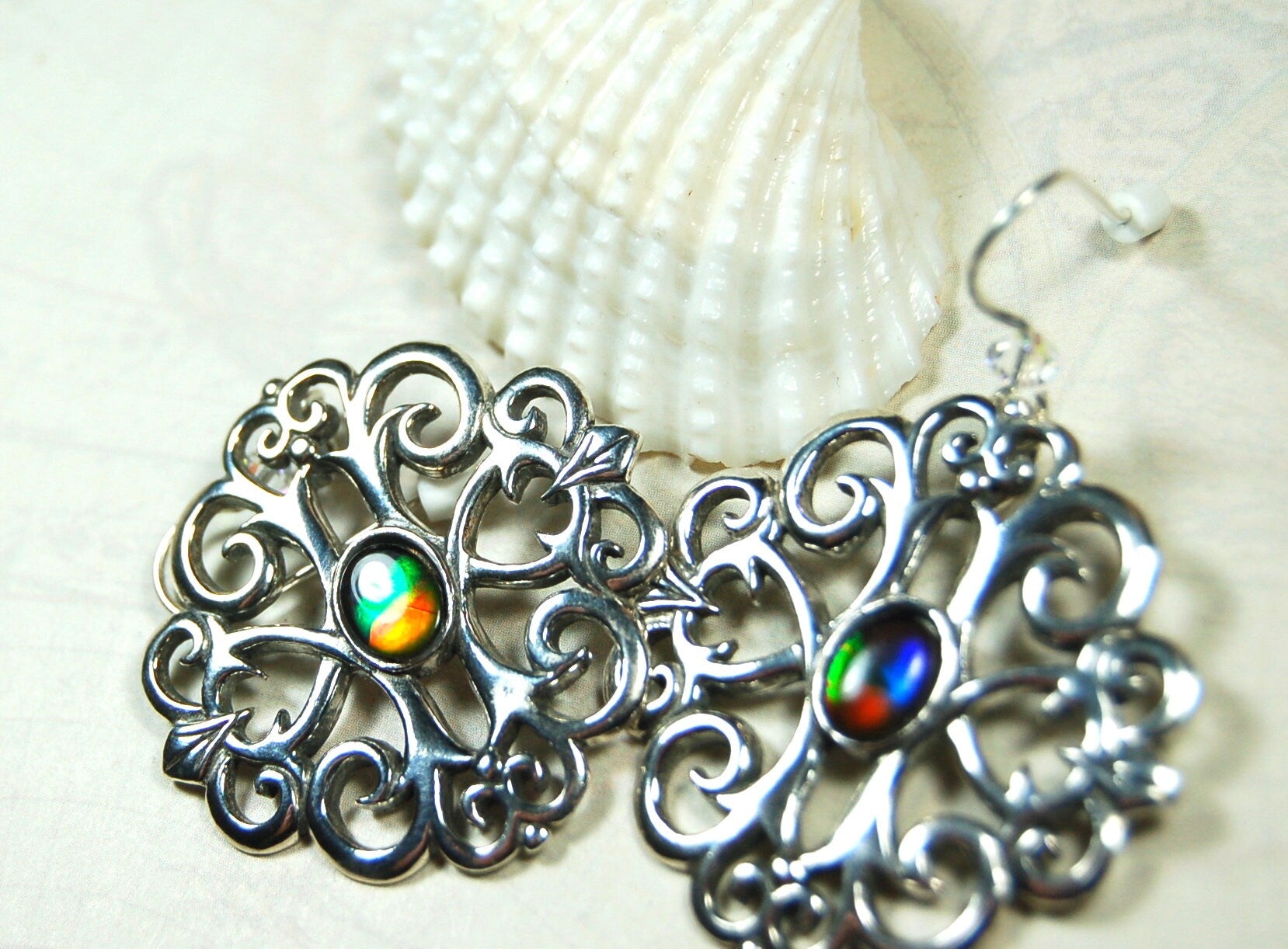Ammolite Earrings.Large showy sterling silver  settings.#111919