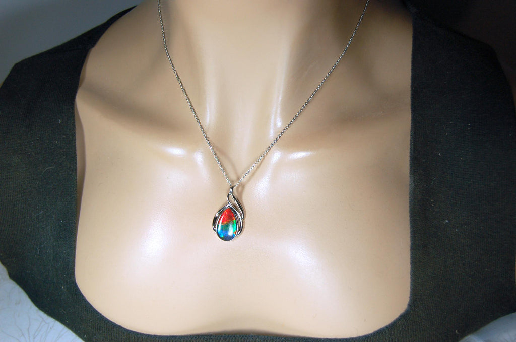 Ammolite JewelryPendant.High quality gem with brilliant colors will attract a lot of attention.#062825