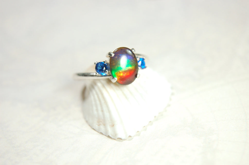 Ammolite Ring with brilliant Spinel side stones.Size 7.
