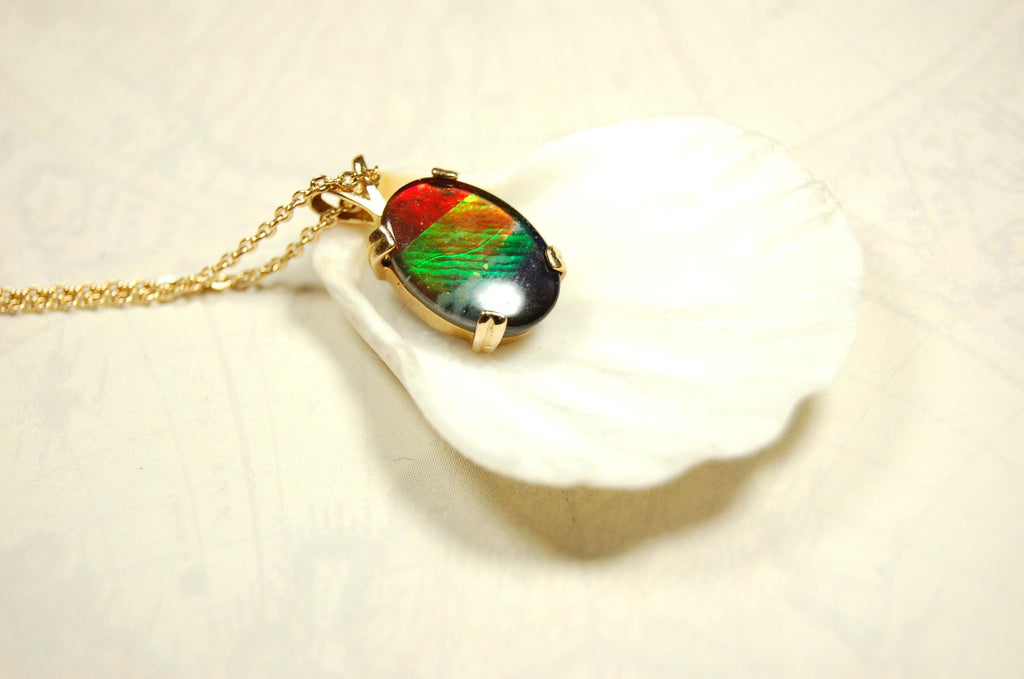 Ammolite necklace pendant in solid 10k yellow gold.A gift your wife will treasure.Brilliant color changer. 071601