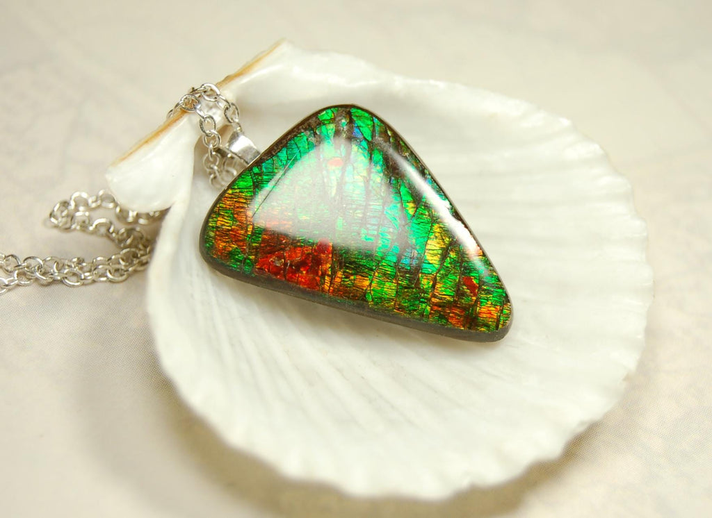 Natural Ammolite Gemstone Pendant from Alberta Canada with bright rich varied colors. A perfect Unisex  birthday gift. 032416
