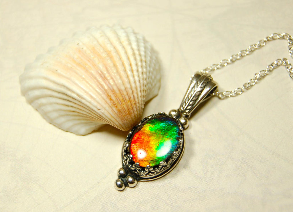 Ammolite pendant gift idea for wife..has four bright colors.041716