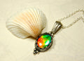 Ammolite pendant gift idea for wife..has four bright colors.041716