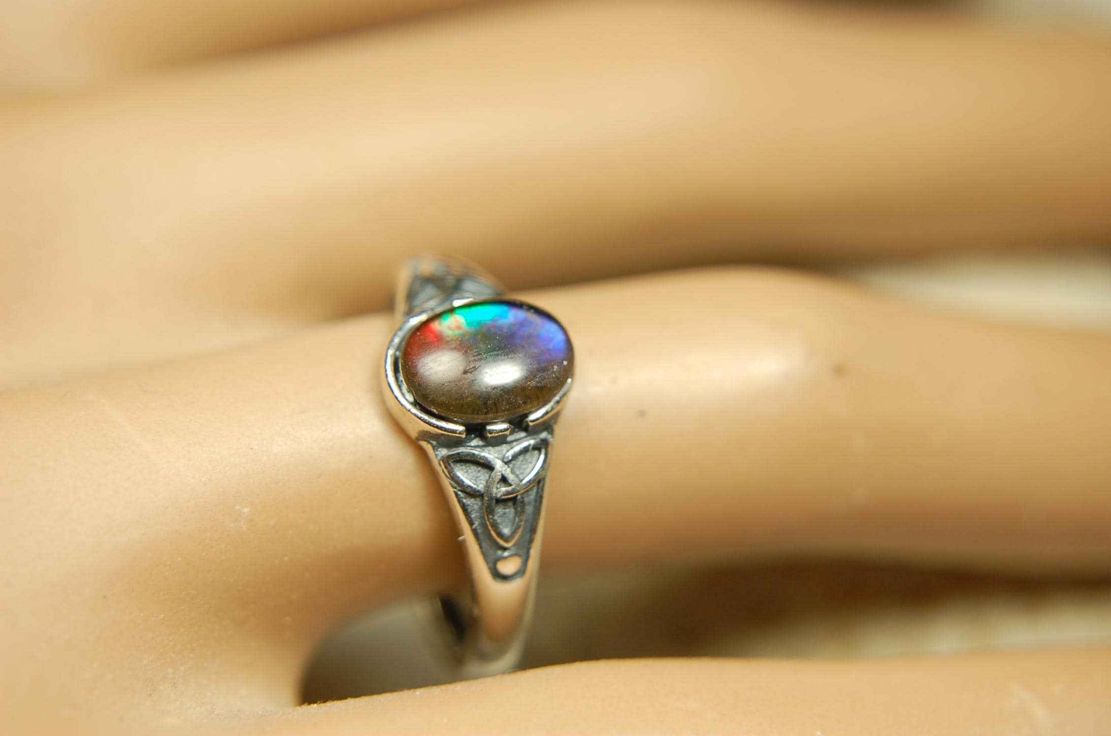 Ammolite Ladies Ring.Sterling Silver.Very feminine, has Celtic design and is in your size too!Brilliant tricolor gem.Gift for her?030816