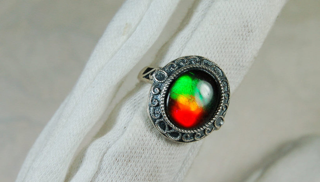 Ammolite Ring.Adjustable fit.Brilliant flashing colors.022219.