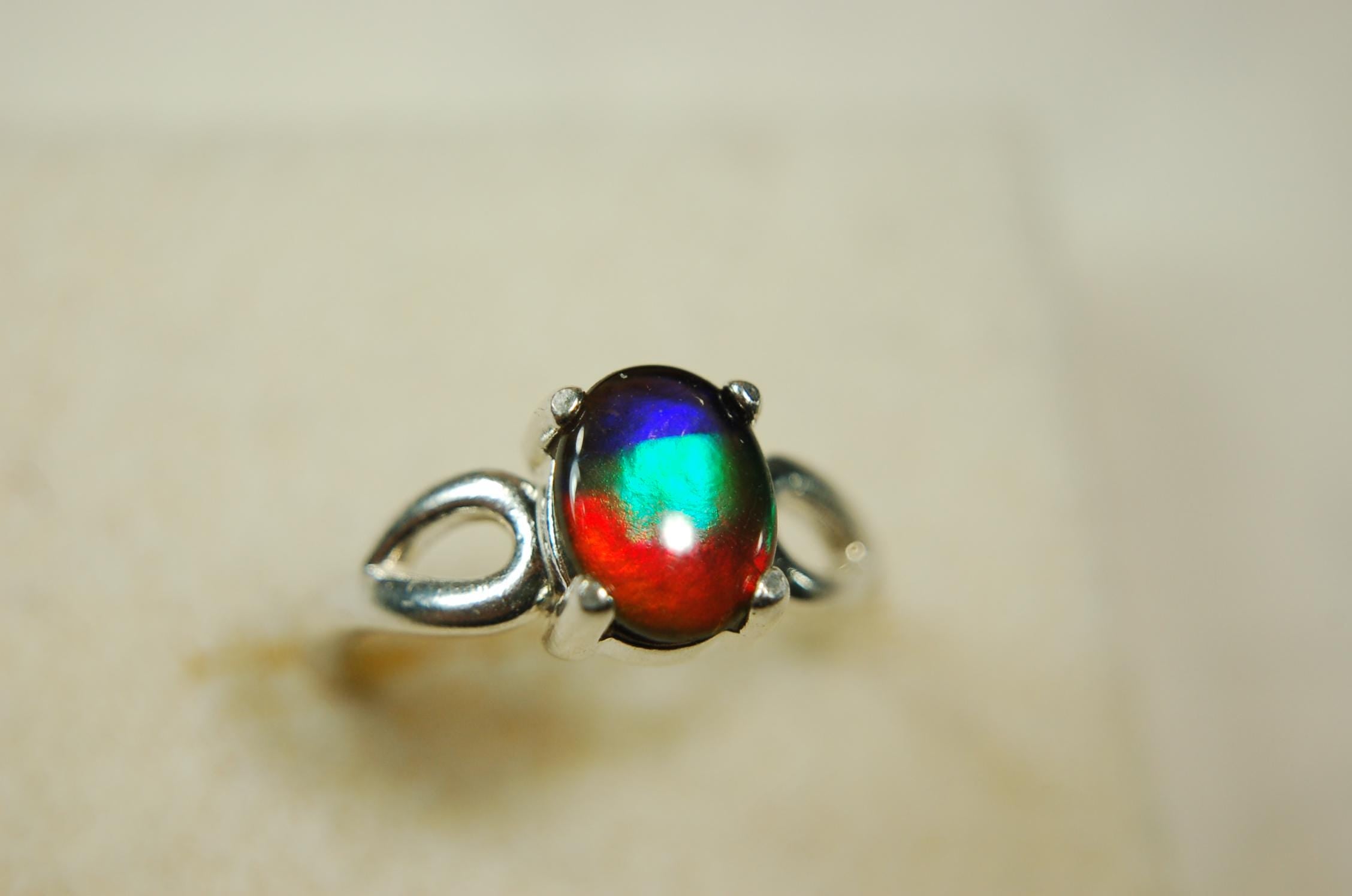 Ammolite.Ammolite ladies ring.Astonishing color changing abilities.Size 7.Gift for wife?.050715