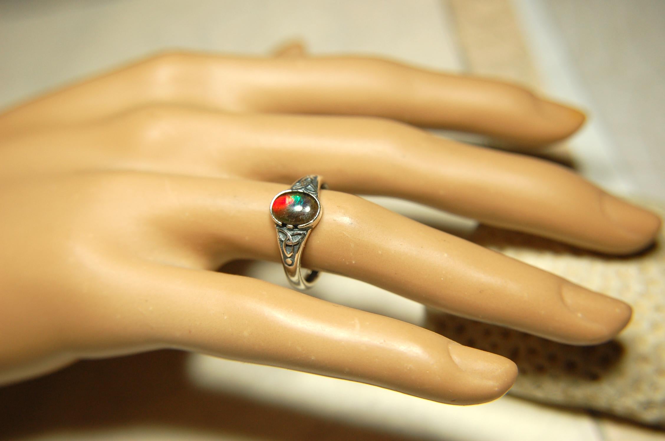Ammolite Ladies Ring.Sterling Silver.Very feminine, has Celtic design and is in your size too!Brilliant tricolor gem.Gift for her?030816
