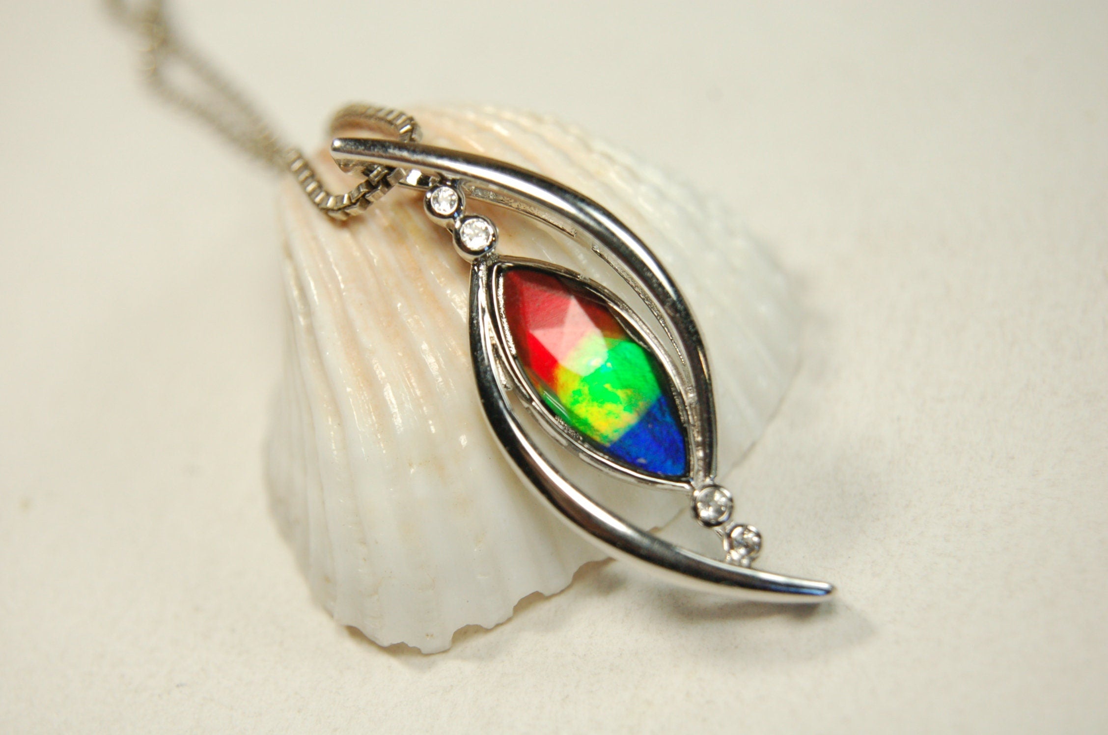 Unique Ammolite Jewelry Pendant Necklace from Canada.RARE Faceted four color gem.Perfect Gift.Bright changing colors. Elegant design 100613.