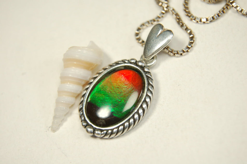 Ammolite pendant conveys a loving heartfelt message.Ammolite jewelry.Four color Rainbow ammolite.Ammolite necklace.Canadian ammolite.100301