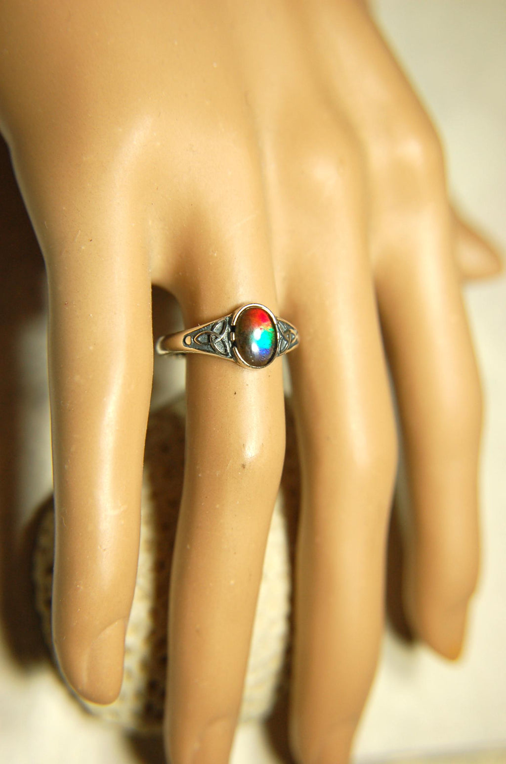 Ammolite Ladies Ring.Sterling Silver.Very feminine, has Celtic design and is in your size too!Brilliant tricolor gem.Gift for her?030816