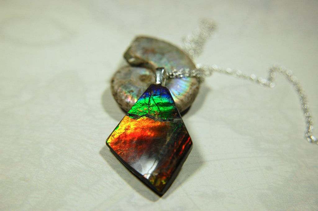 Ammolite pendant necklace.Unique raw natural cabochon with brilliant varied colors.Unisex design.Boho jewelry.031716