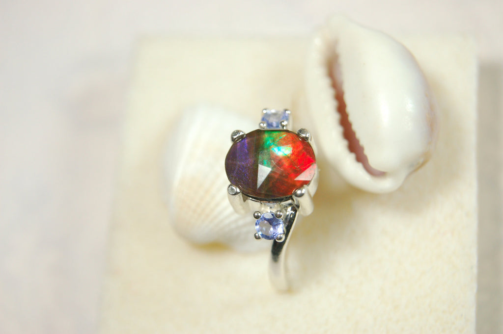 Ammolite Jewelry Ring with Tanzanites.No import taxes under CUSMA rules.022414