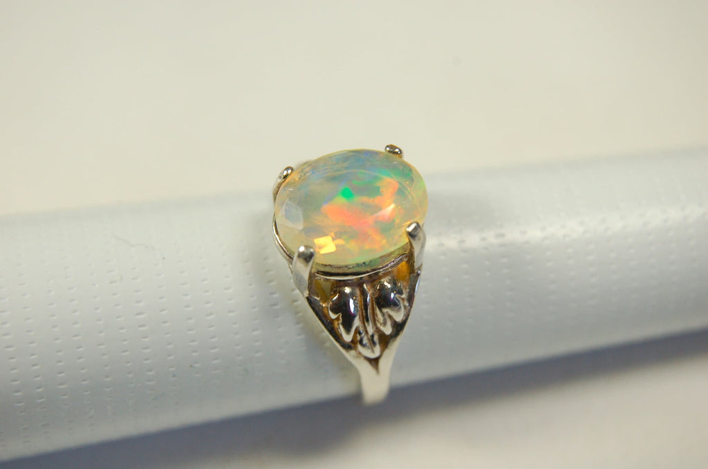 Opal ring.Bright Faceted Natural gem.Lovely flashing colors.#102612