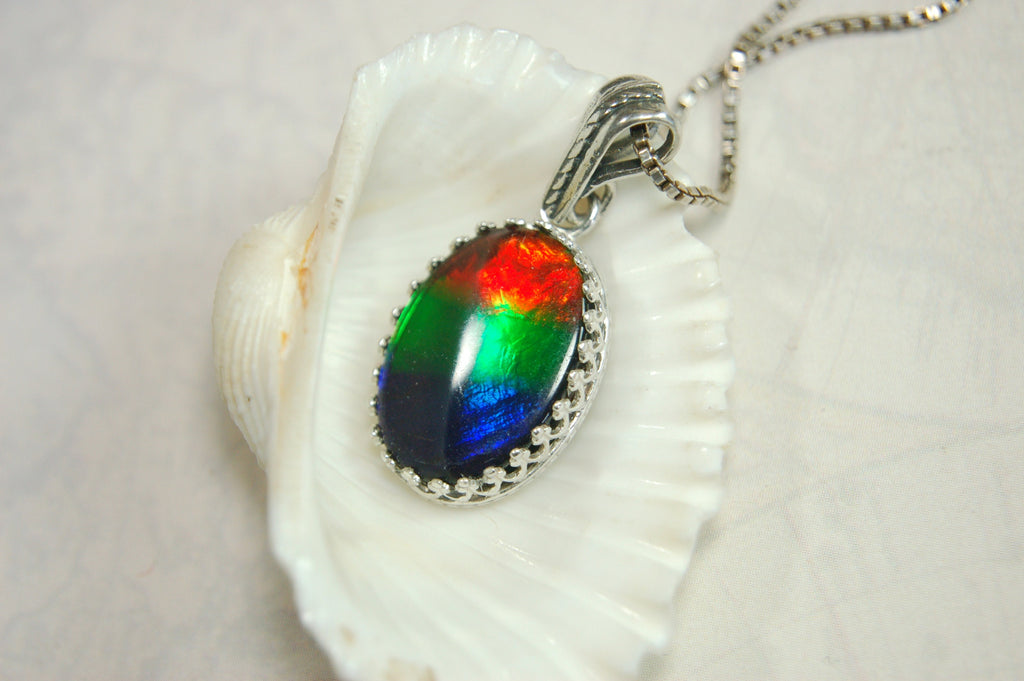 Colorful ammolite pendant - a one-of-a-kind addition to your collection or a perfect gift for someone special"021224